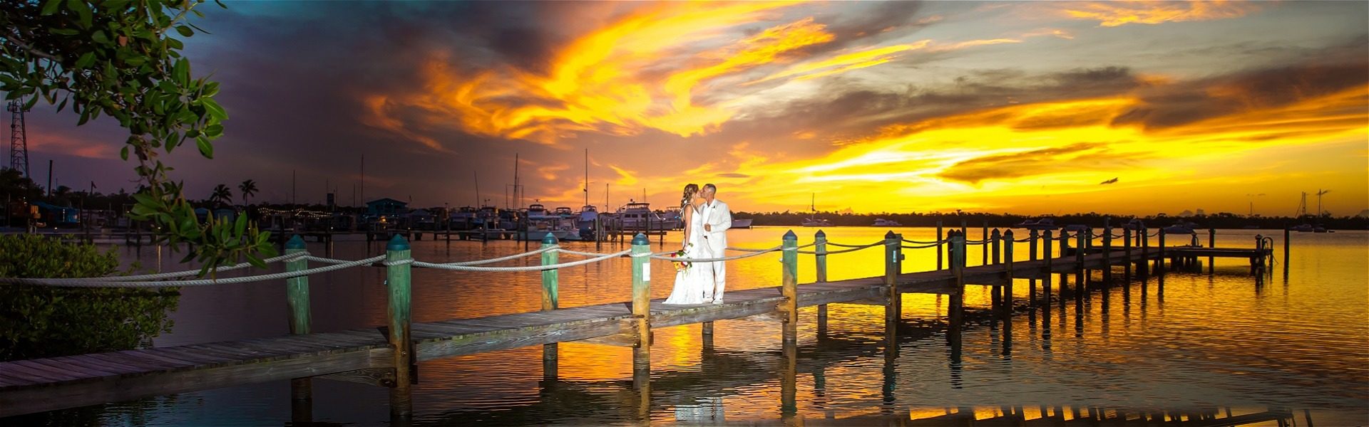 Dramatic sunset and the happy couple